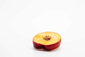 Sliced peaches on a white background