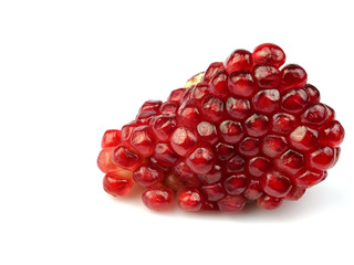 Fruit red pomegranate seeds, isolated on a white background, herbs, fruit kingdom.