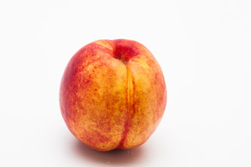 Fresh ripe Peach on a white background 