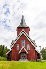 Fototapeta na wymiar Pictureque wooden Hol church (Hol kirke) in Leknes on the island Vestvagoy in Nordland county, Norway