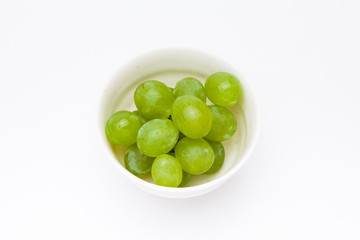Green grapes with bowl 