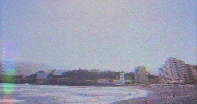 VHS effect. time lapse of a beach in 80s VHS version. Effect of a damaged videotape of a beach. 80s holiday. Vintage documentary and timelapse