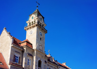 Fototapeta na wymiar Town Hall in town Leibnitz in Styria of Austria. Street architecture. Blue sky on the background.