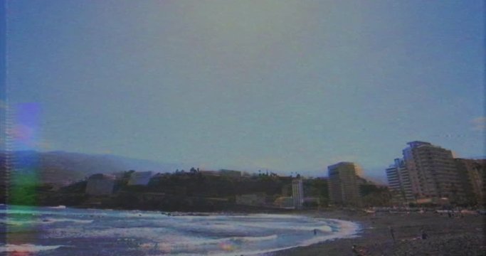 VHS effect. time lapse of a beach in 80s VHS version. Effect of a damaged videotape of a beach. 80s holiday. Vintage documentary and timelapse