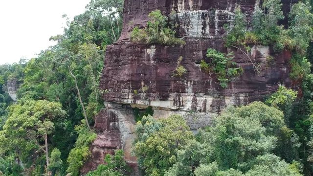 Reveal of scenic cliff in the jungle, Borneo, Malaysia