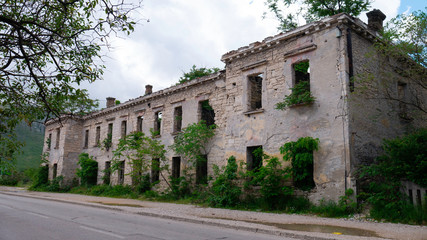 Fototapeta na wymiar Destroyed Building on The front line in Mostar, Bosnia and Herzegovina.