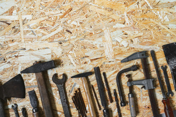 Concept for the Happy Father's Day holiday. Old vintage carpenter's construction tools on a wooden...