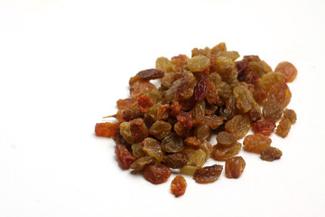 a pile of raisins isolated on white background flat lay. Horizontal image.