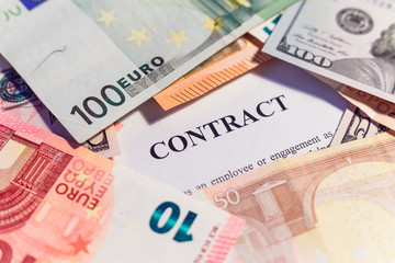Money and contract title background.