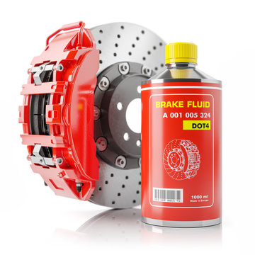 Brake disc, car red caliper and brake fluid can. Spare parts. Car repair