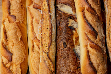French baguettes. Fresh crisp bread. Bread background.