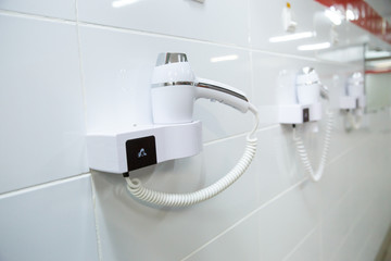  wall-mounted hair dryer for drying hair in a common shower