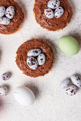 Easter cookies in shape of nest with eggs