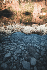lake and reflection of mountains in background. Leopoldsteiner see,Styria,Austria.