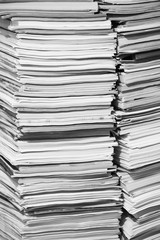 A Tall Pile Of Papers, Documents & Magazines