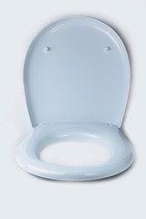 on a white background, a toilet lid. close-up. isolation.