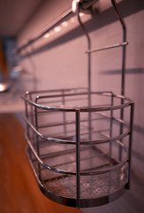 Fototapeta na wymiar Steel cage at kitchen bokeh background