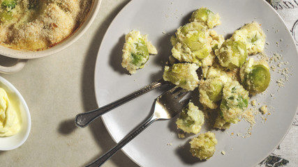 Brussels sprouts baked with cottage cheese, feta cheese and sour cream, breaded