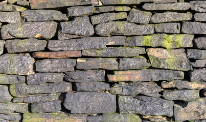 old stone wall of stones