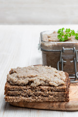 Forshmak paste from herring with herbs isolated on white