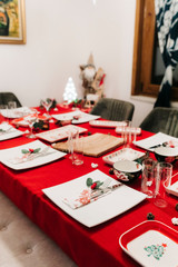 Christmas dinner table with traditional Turkish Cuisine food and red new year concept. 