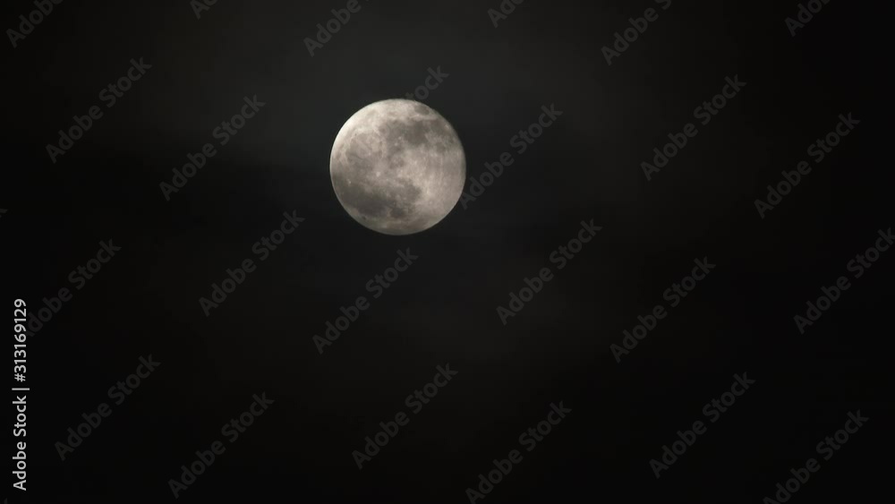 Canvas Prints close up bright full moon with cloud layer real time