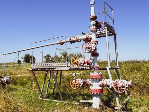 Well for oil and gas production. Oil well wellhead equipment. Oil production