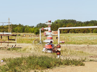 Well for oil and gas production. Oil well wellhead equipment. Oil production