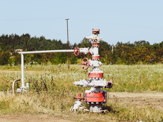 Well for oil and gas production. Oil well wellhead equipment. Oil production