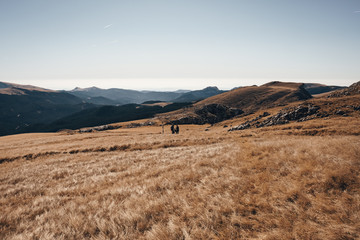 Hikers on Mountain in Fall
