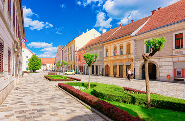 Fototapeta na wymiar Street in Old city in Varazdin in Croatia. Cityscape with tourists in famous Croatian town in Europe in summer