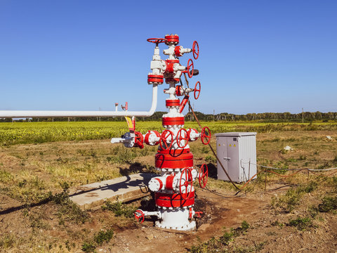 Well for oil and gas production. Oil well wellhead equipment. Oil production