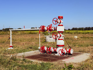 Well for oil and gas production. Oil well wellhead equipment. Oil production