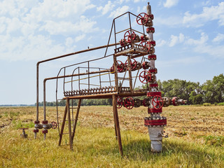 Well for oil and gas production. Oil well wellhead equipment. Oil production