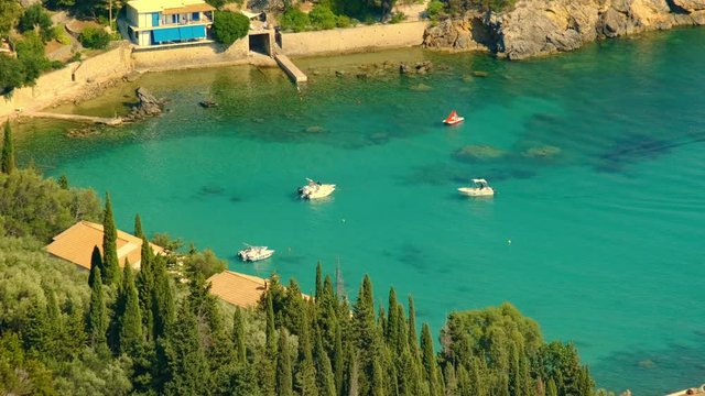 View from above on Paleokastritsa bay in a sunny day, Corfu island, Greece. ProRes 422HQ 10 Bit mov.