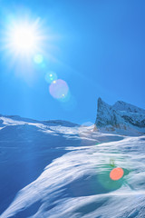 Peaks of Hintertux Glacier ski resort of Tyrol in Mayrhofen in Zillertal valley in Austria in winter Alps. Nature in Hintertuxer Gletscher in Alpine mountains with white snow. Sun shining.