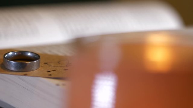 close up sliding pan shot of partners handwritten message note to loved one, valentines day