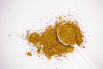 Curry powder on white background