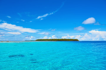 Fototapeta na wymiar Island at the edge of the atoll