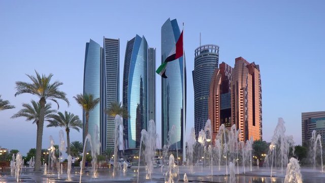 Etihad Towers viewed over the fountains of the Emirates Palace Hotel, Abu Dhabi, United Arab Emirates, Middle East
