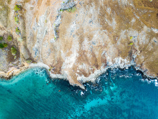 Padar Island arial view of the turquoise color water in Flores, Indonesia   