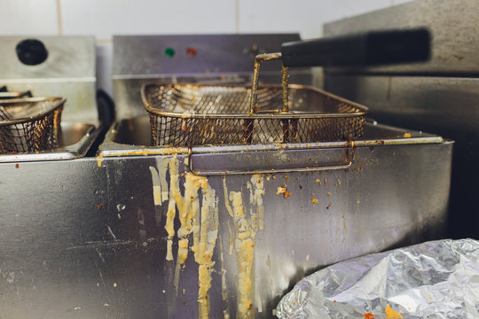 Deep Fryer With Oil On Restaurant Kitchen.
