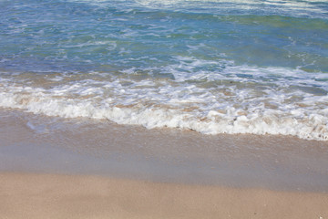 Fototapeta na wymiar Sandy beach on the sea in south korea with wave water 