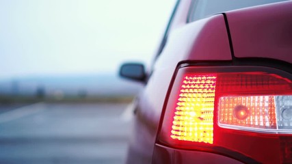 Car's turn signal blinking on the back