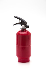 Naklejka premium Red fire extinguisher on white background