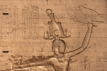 ancient egyptian architecture ruins. hieroglyphs and columns of the Temple of Horus at Edfu, in...