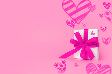 Valentine's Day background. Gift box on pastel pink background. Valentines day concept. Copy space