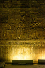 enlightened hieroglyphs Inside the sanctuary at the centre of the egyptian Temple of Horus at Edfu,...