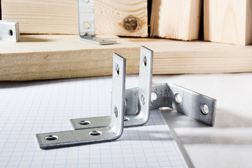 Metal corners for fastening wooden boards