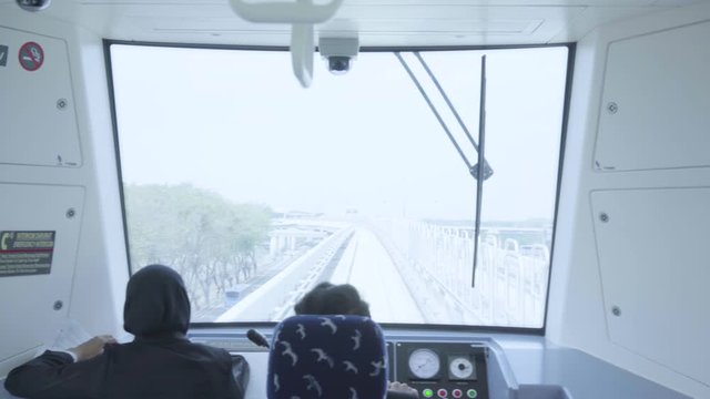 Two drivers driving Soekarno Hatta Airport Skytrain